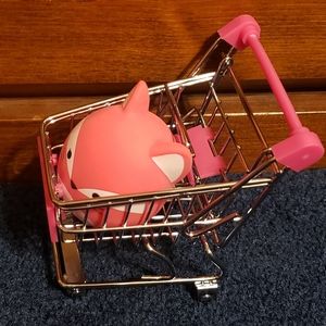 Squishmallow Squooshems fox stress ball toy in mini shopping cart.